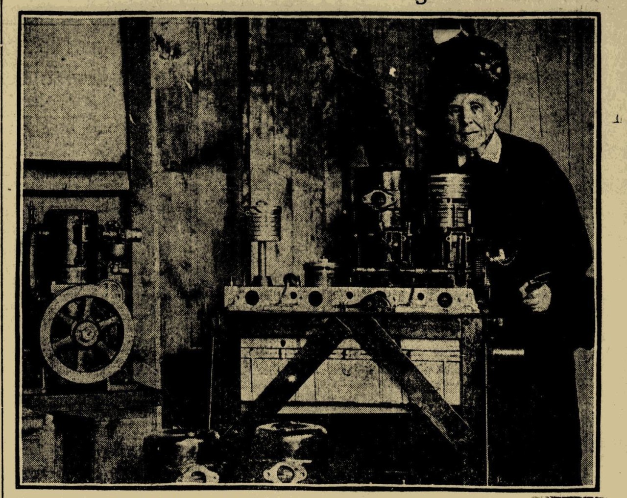 MARGARET E. KNIGHT AT WORK IN HER EXPERIMENTING ROOM
