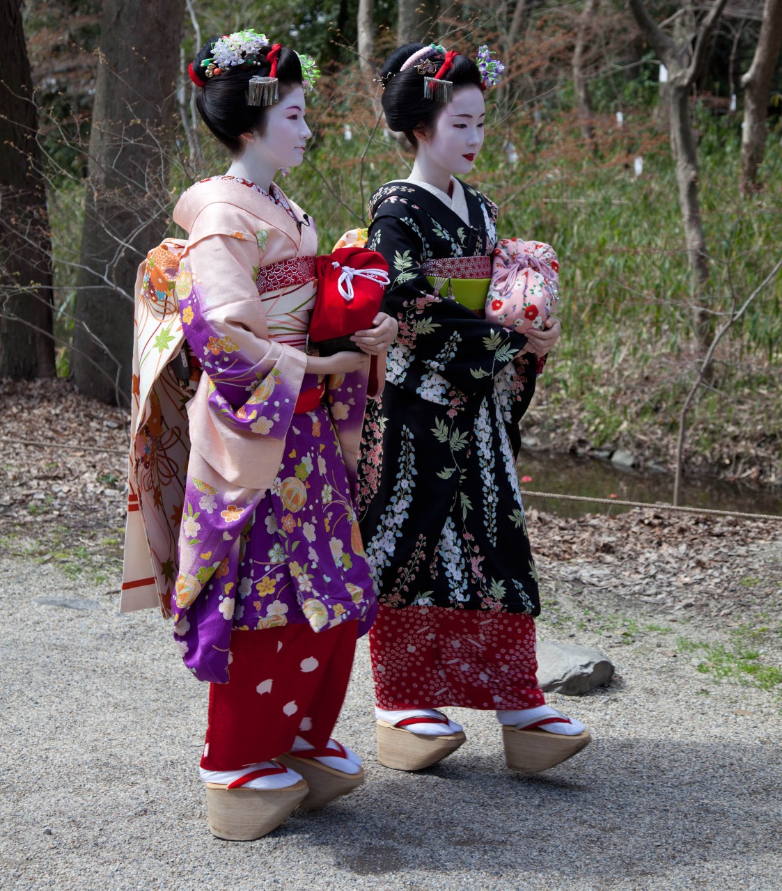 Two Kyoto maiko walking
