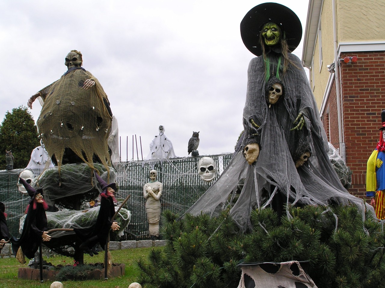 At Halloween, yards, public spaces, and some houses may be decorated with traditionally macabre symbols including skeletons, ghosts, cobwebs, headstones, and witches