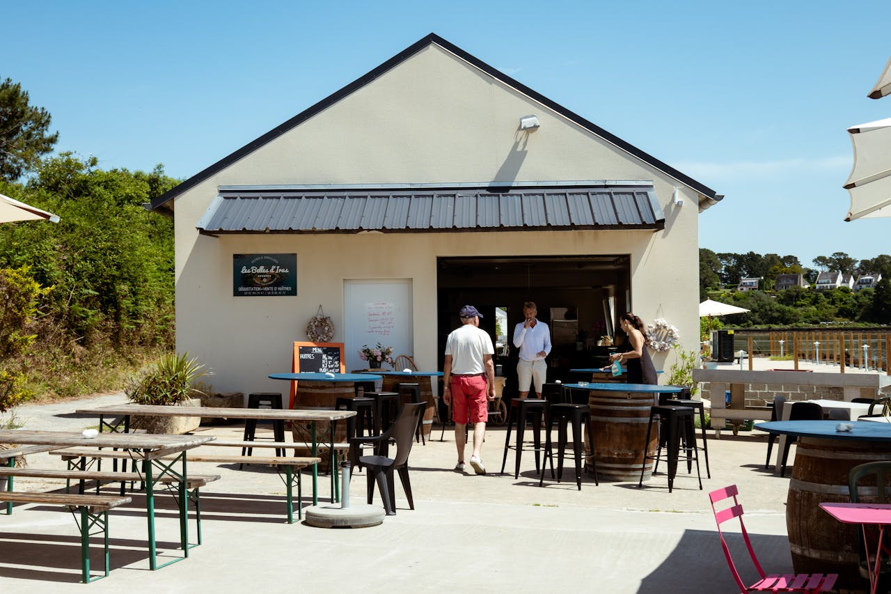 Outdoor Café with Customers on a Sunny Day