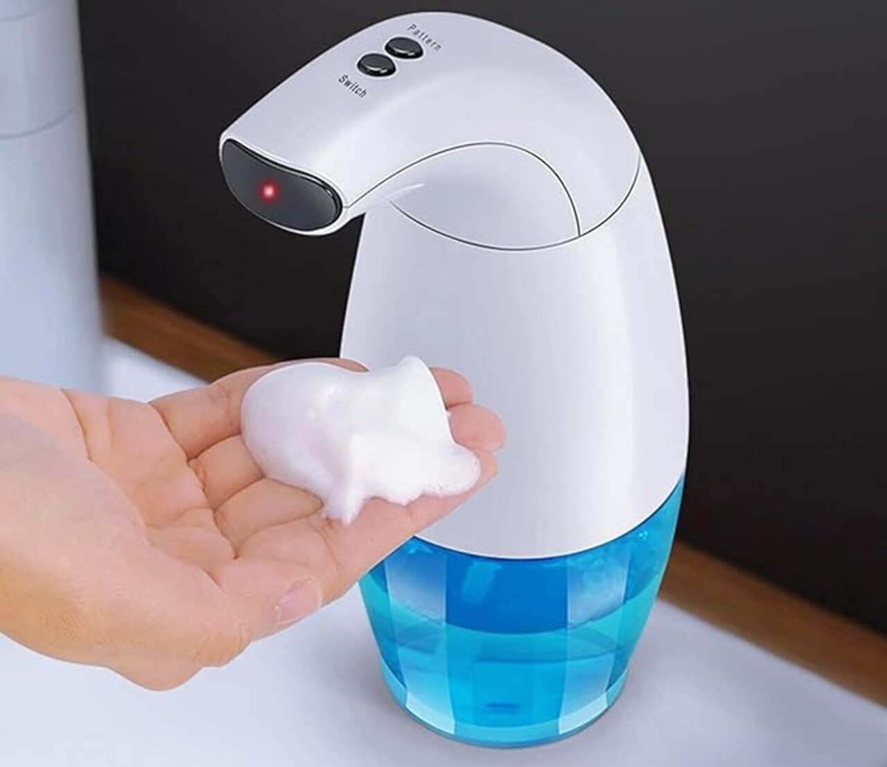 Automatic, touchless soap dispensers