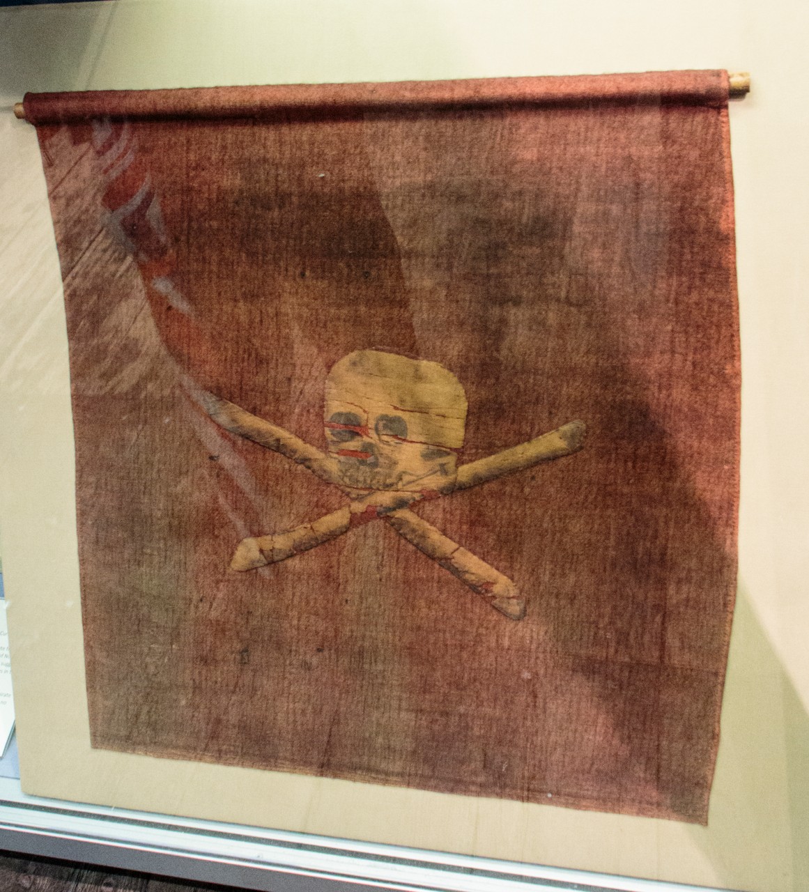 This red flag, captured by the Royal Navy in 1780 and now on display at the National Museum of the Royal Navy, Portsmouth, is the only other surviving authentic Jolly Roger flag.