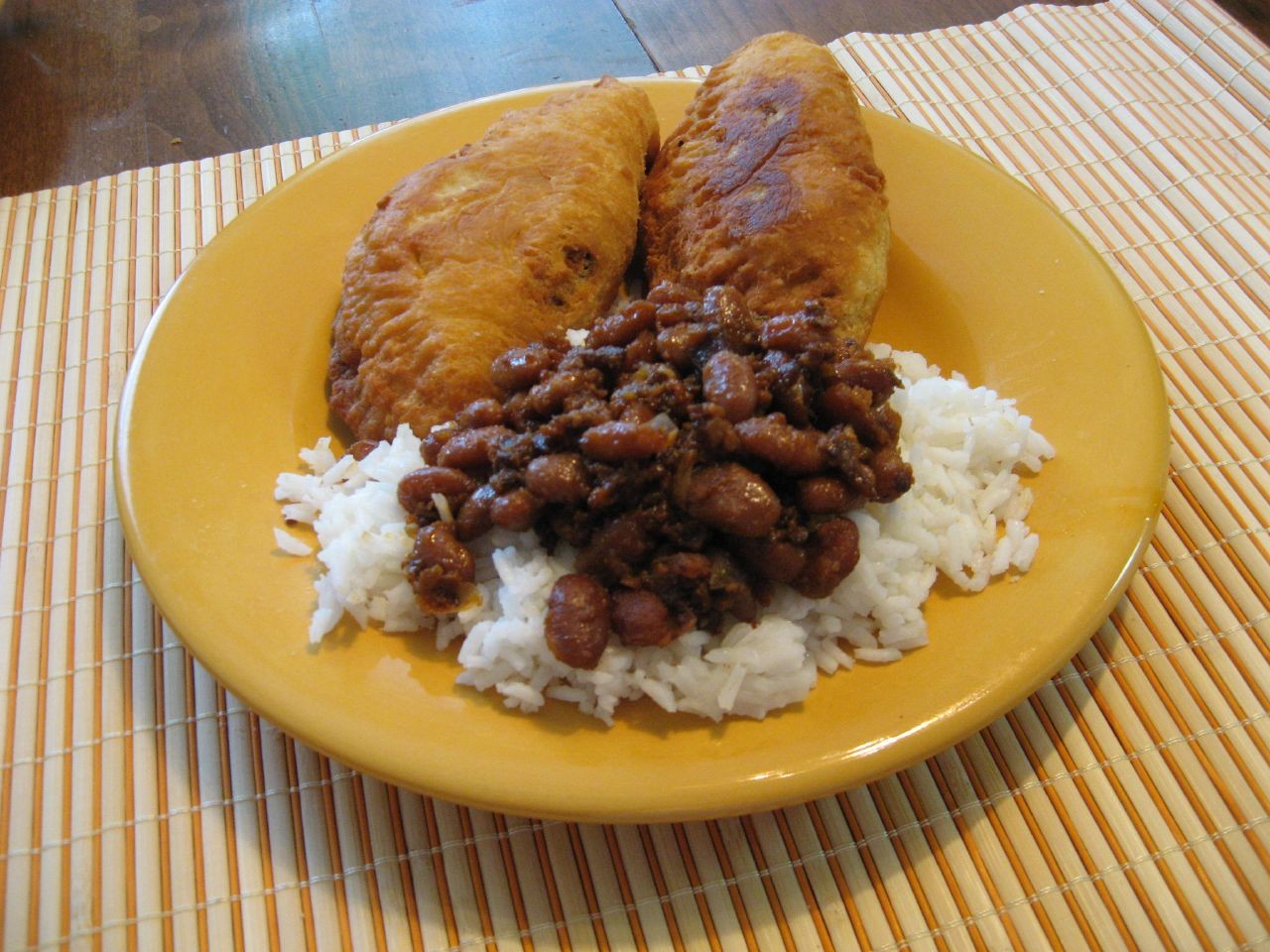 Natchitoches meat pie with beans and rice