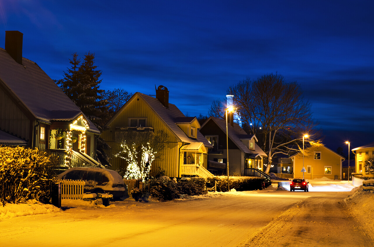 A New Year’s midnight street scene in a Scottish village.