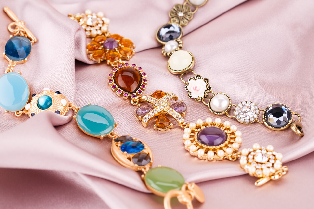 A flat lay styled with Victorian-inspired jewelry