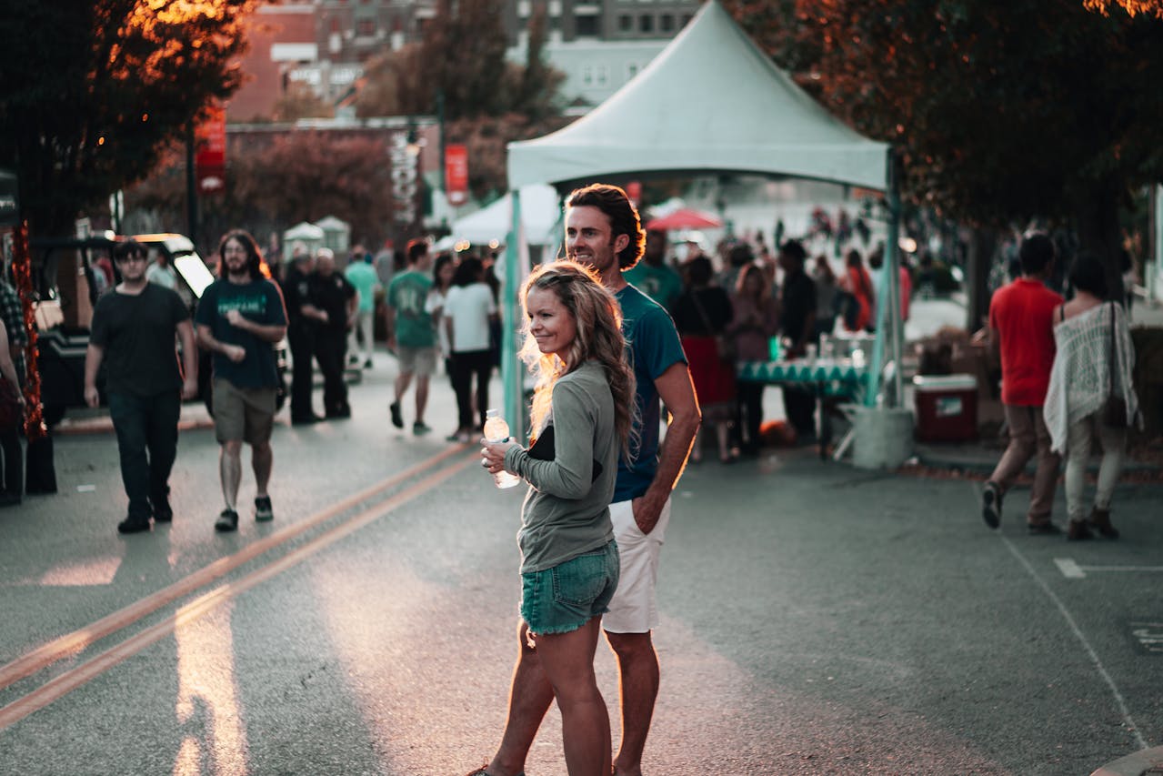 Smiling traveler experiencing a local cultural event.