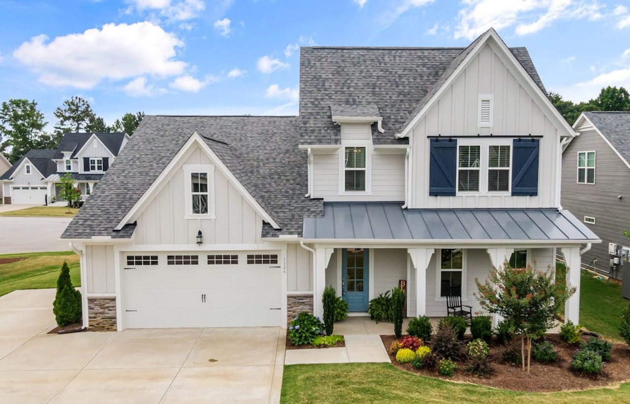 A completed garage conversion with new windows.
