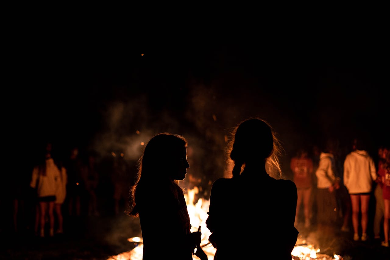 A community bonfire roped off
