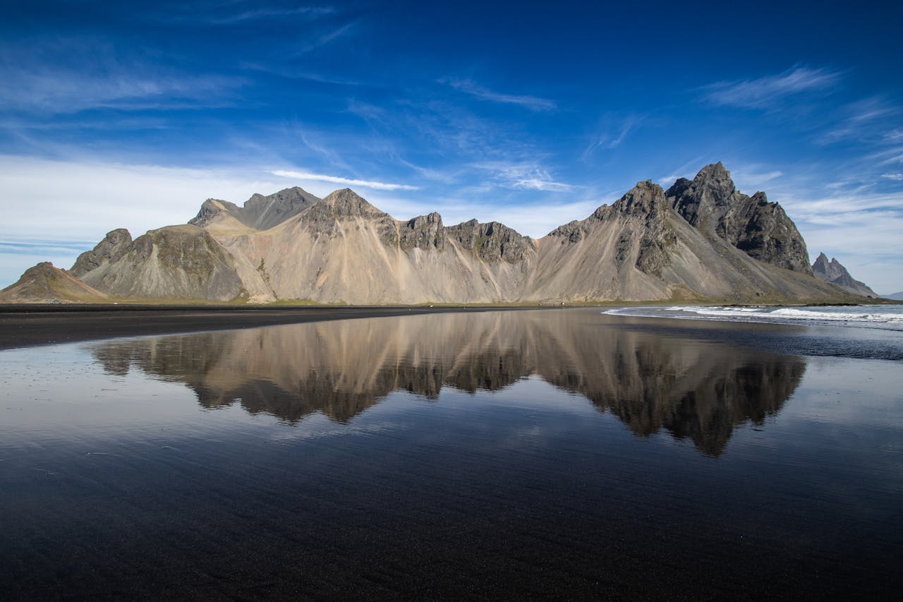 A wide horizon shot with open sky and distant mountains,