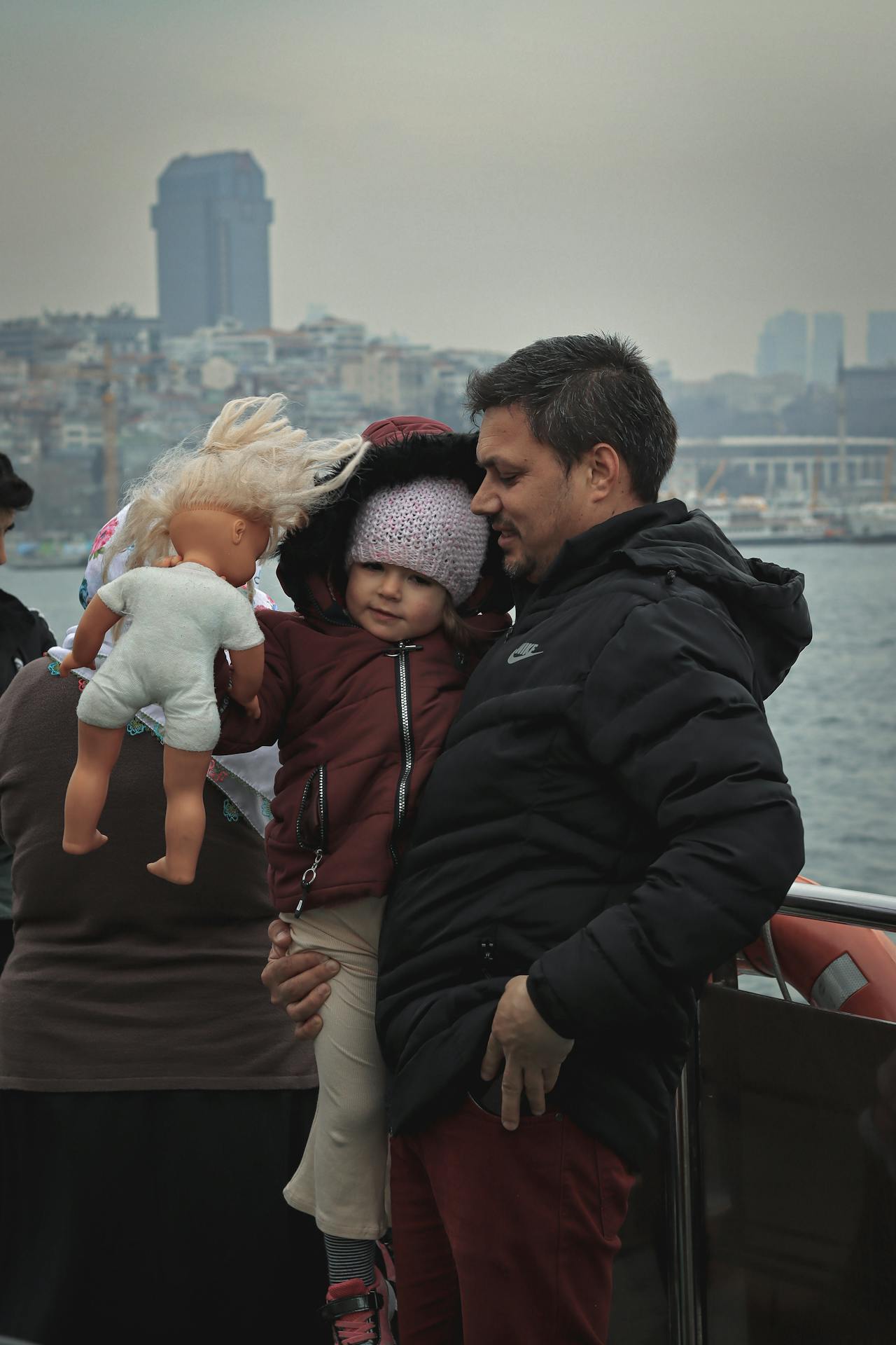 Parent holding a child protectively