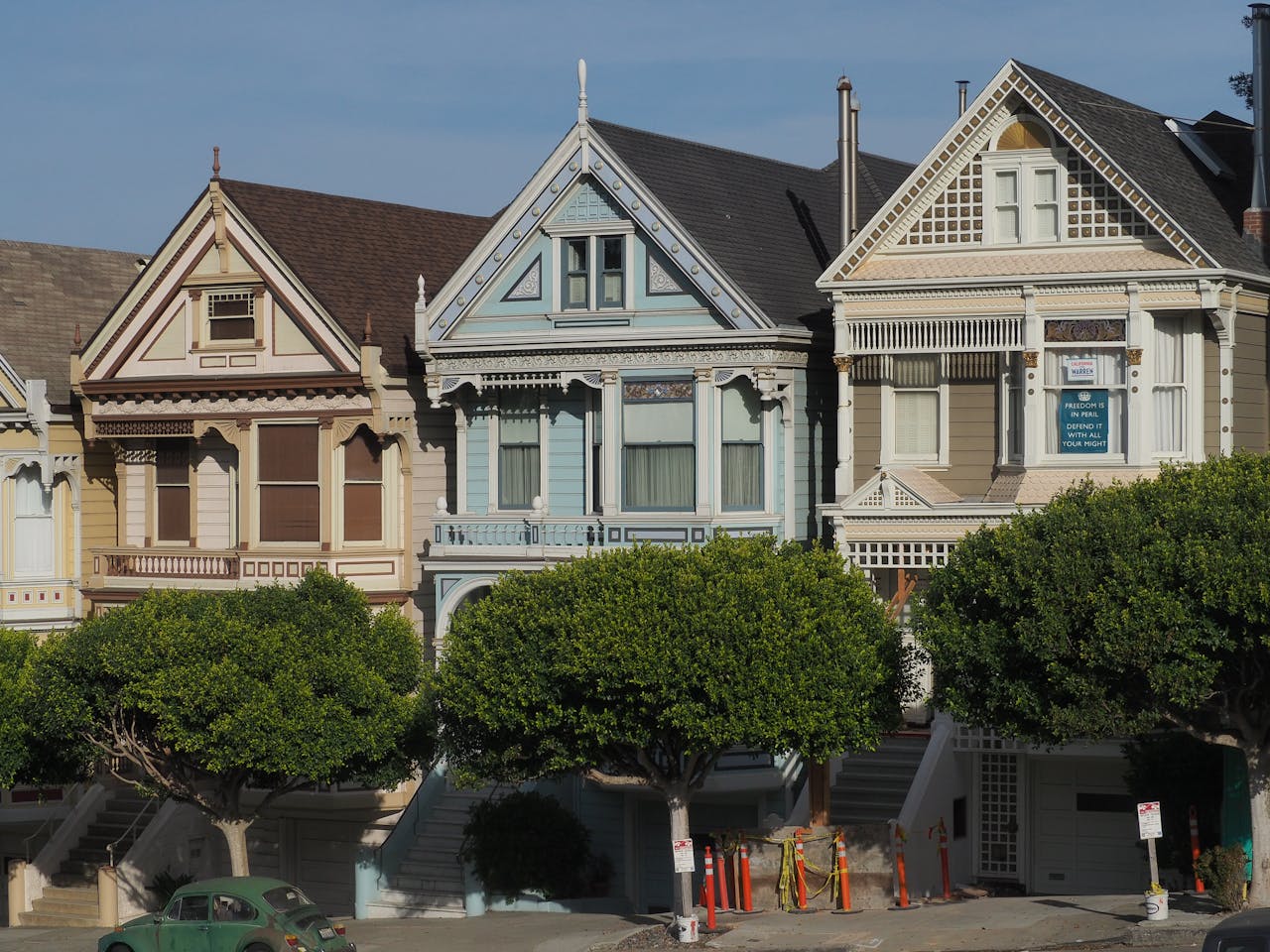 A row of houses with uniform roof colors.