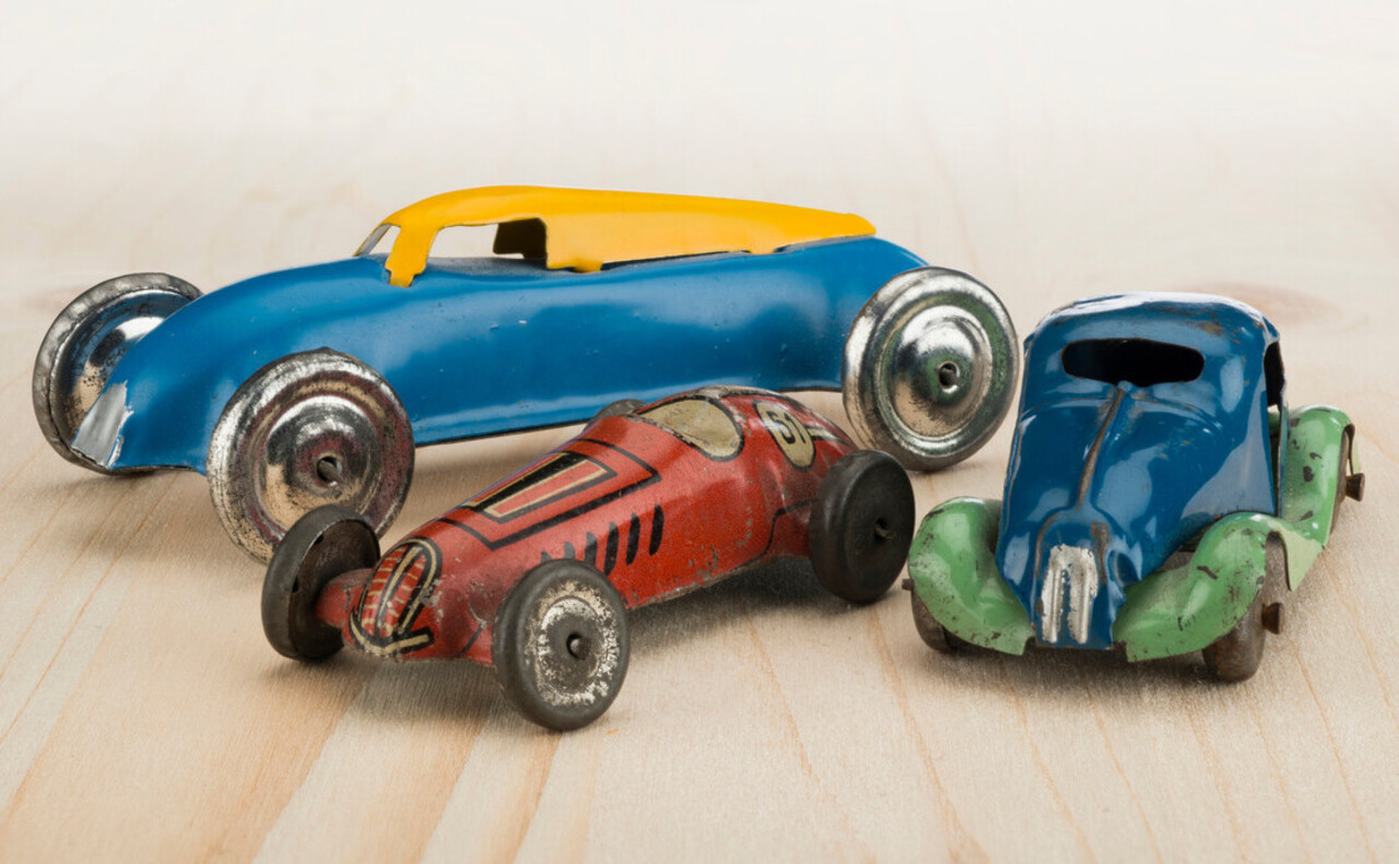 You raced tin lithographed cars across the floor