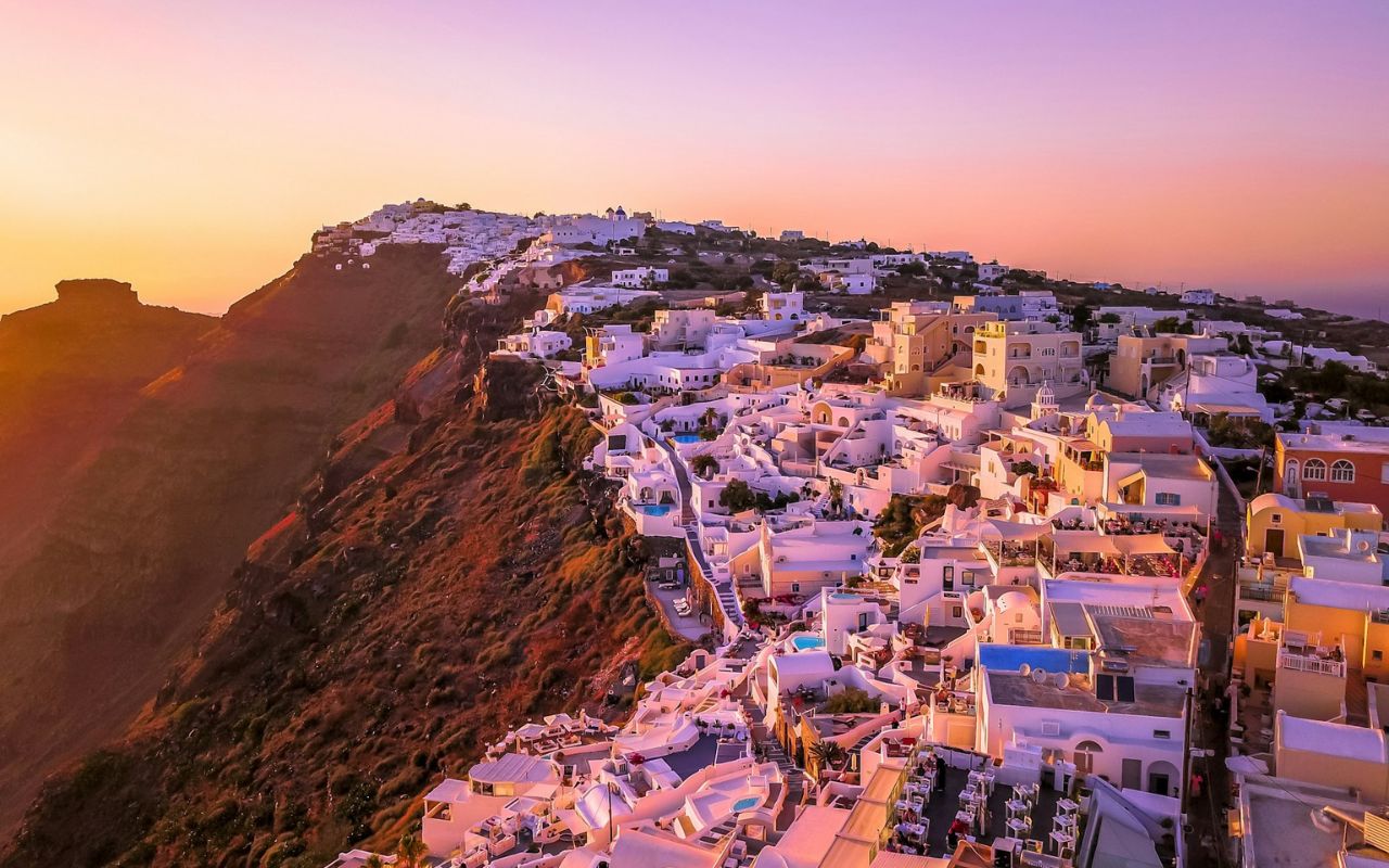 Santorini’s Famous Sunsets, Packed with Crowds