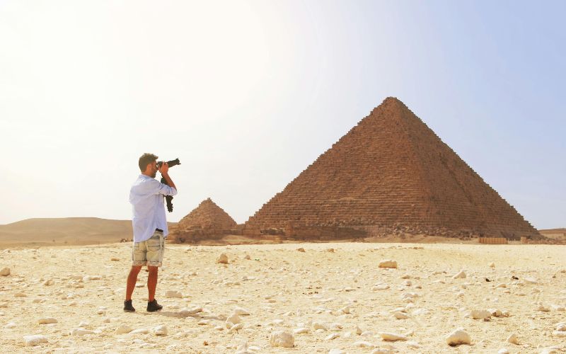 Tourist ignoring “No Photography” sign