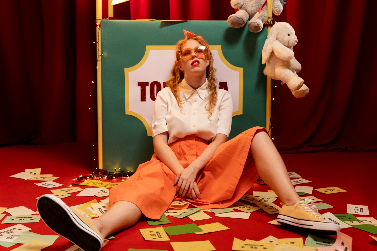 Star in a custom-designed ensemble featuring playful textures and unique cut, reflecting individuality and personal expression over traditional red carpet norms.