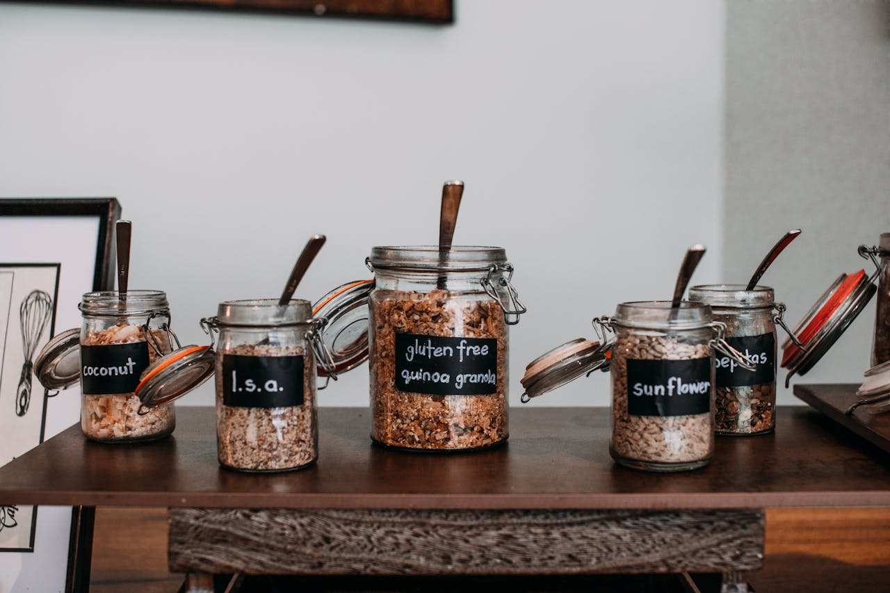 Bulk-cooked grains stored in clear containers for easy meal prep.
