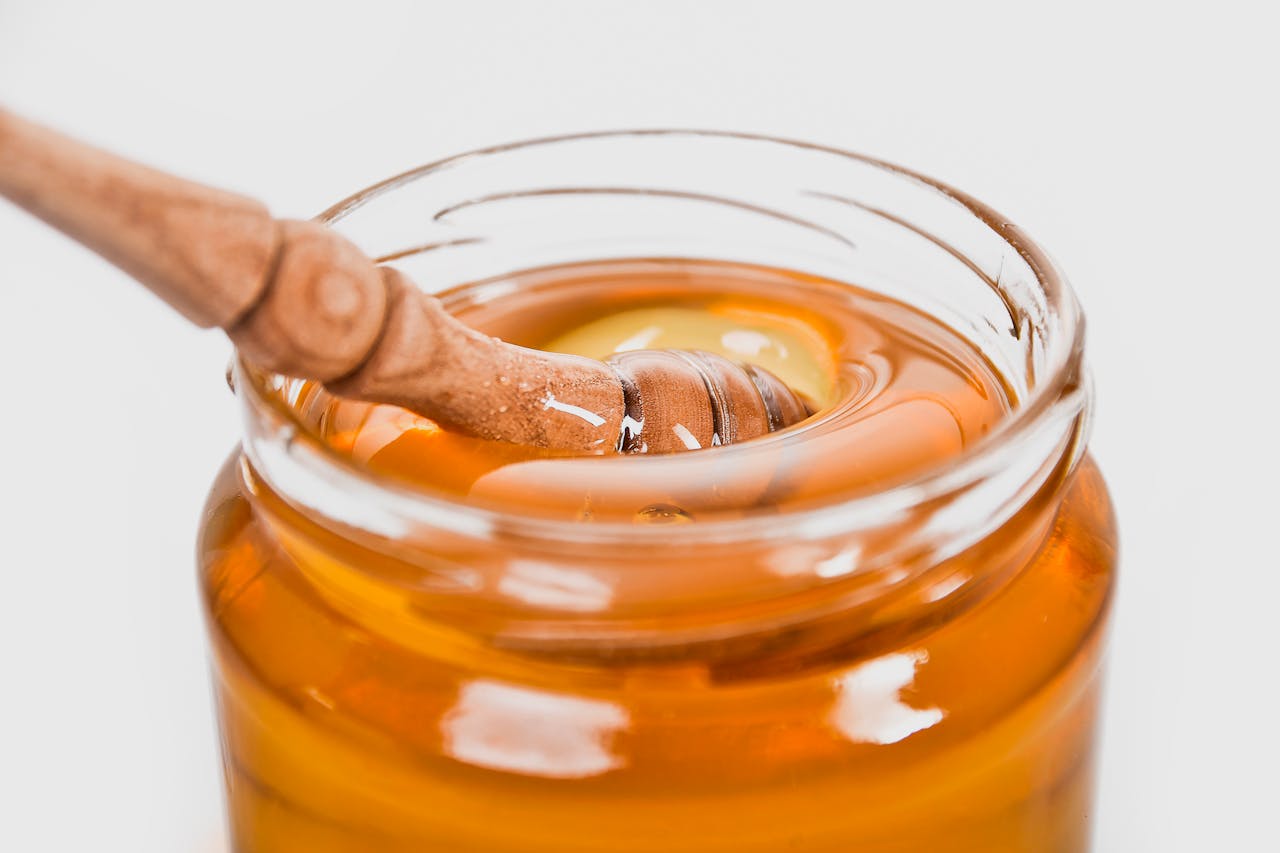 Honey, maple syrup, and date syrup as natural alternatives to refined sugar.