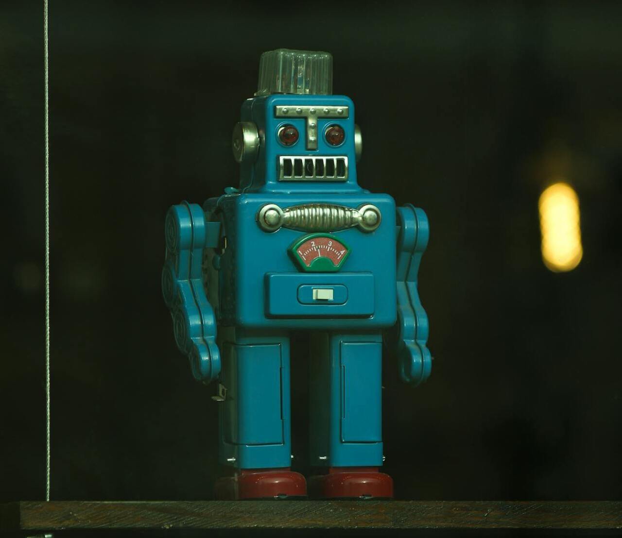 You watched tin wind-up robots march and spark
