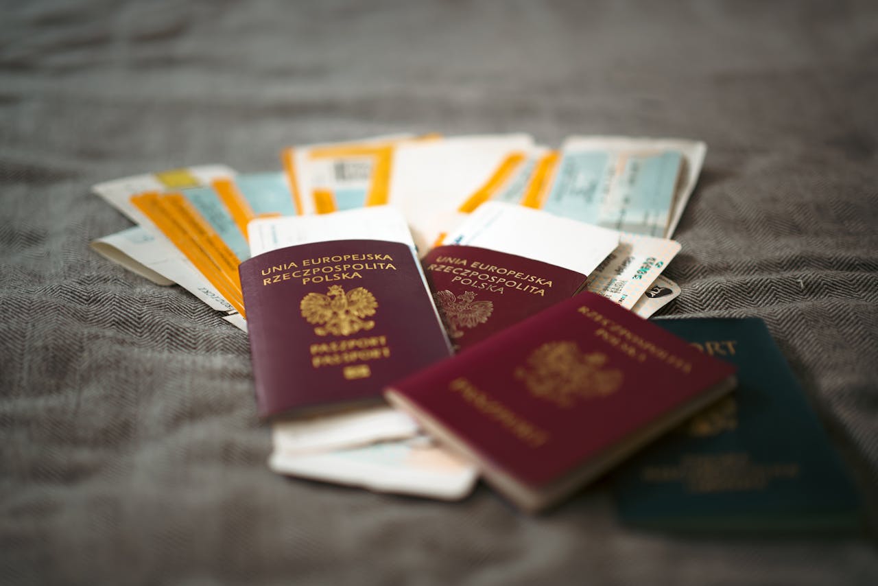 Passport and boarding passes on table, illustrating that not all travel requires a passport in every location.