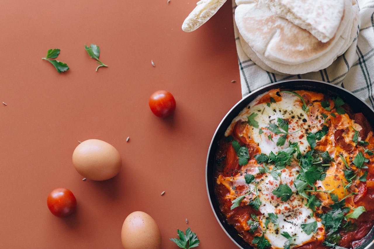 Hotdish served in a simple casserole dish with a side of bread, highlighting an affordable, hearty meal for families.