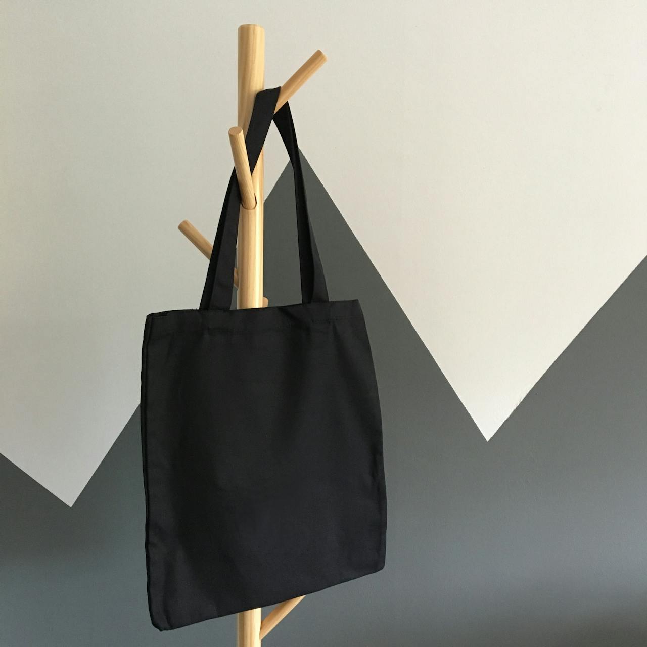 Foldable tote bag used for extra items, shopping, or laundry while traveling.