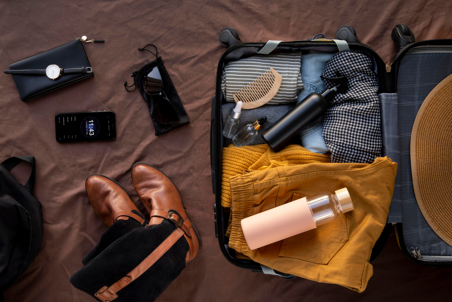 Backup essentials including clothing, chargers, and toiletries packed for travel delays.