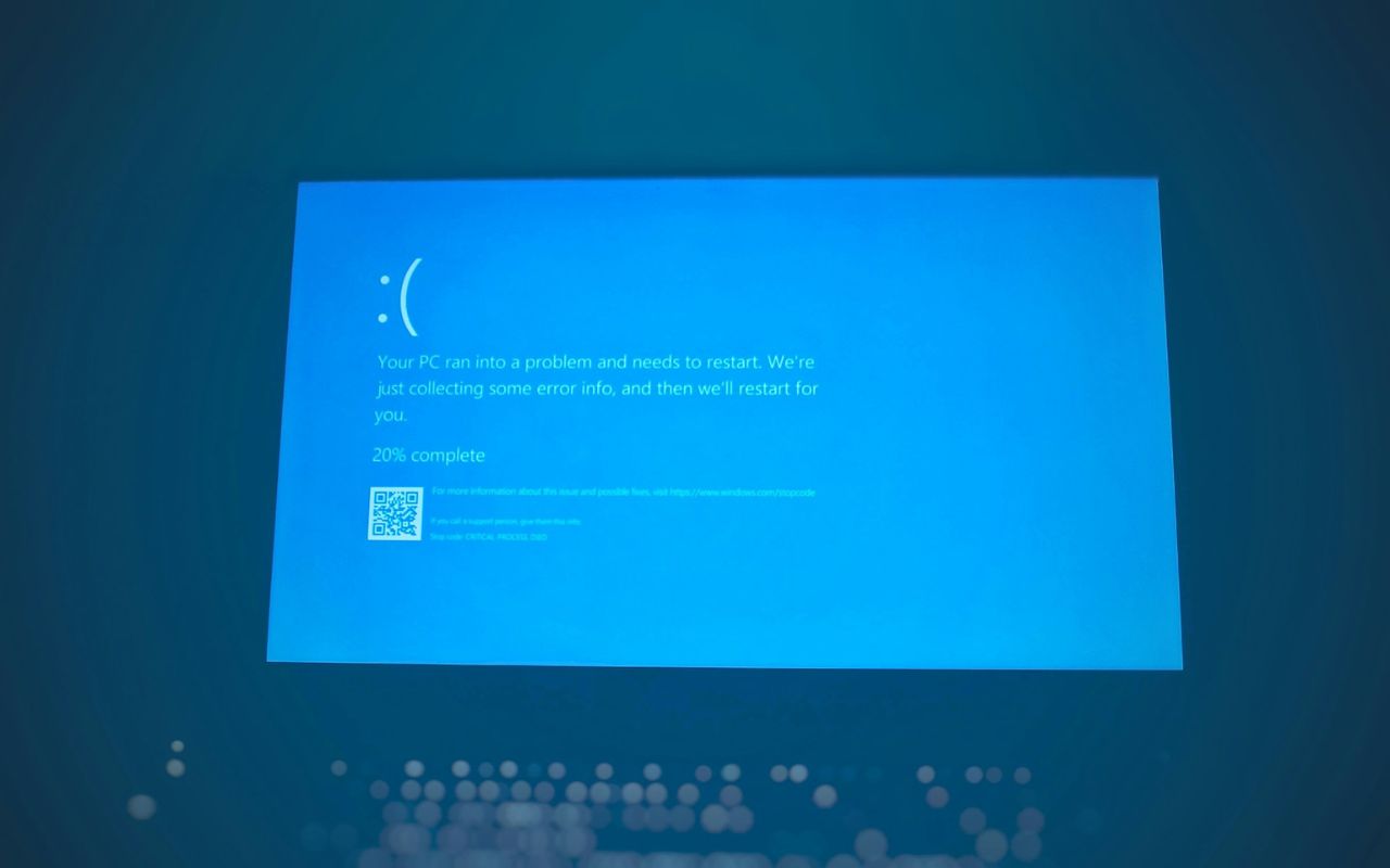 Windows 11 PC showing multiple error messages and frozen applications after a failed fix.
