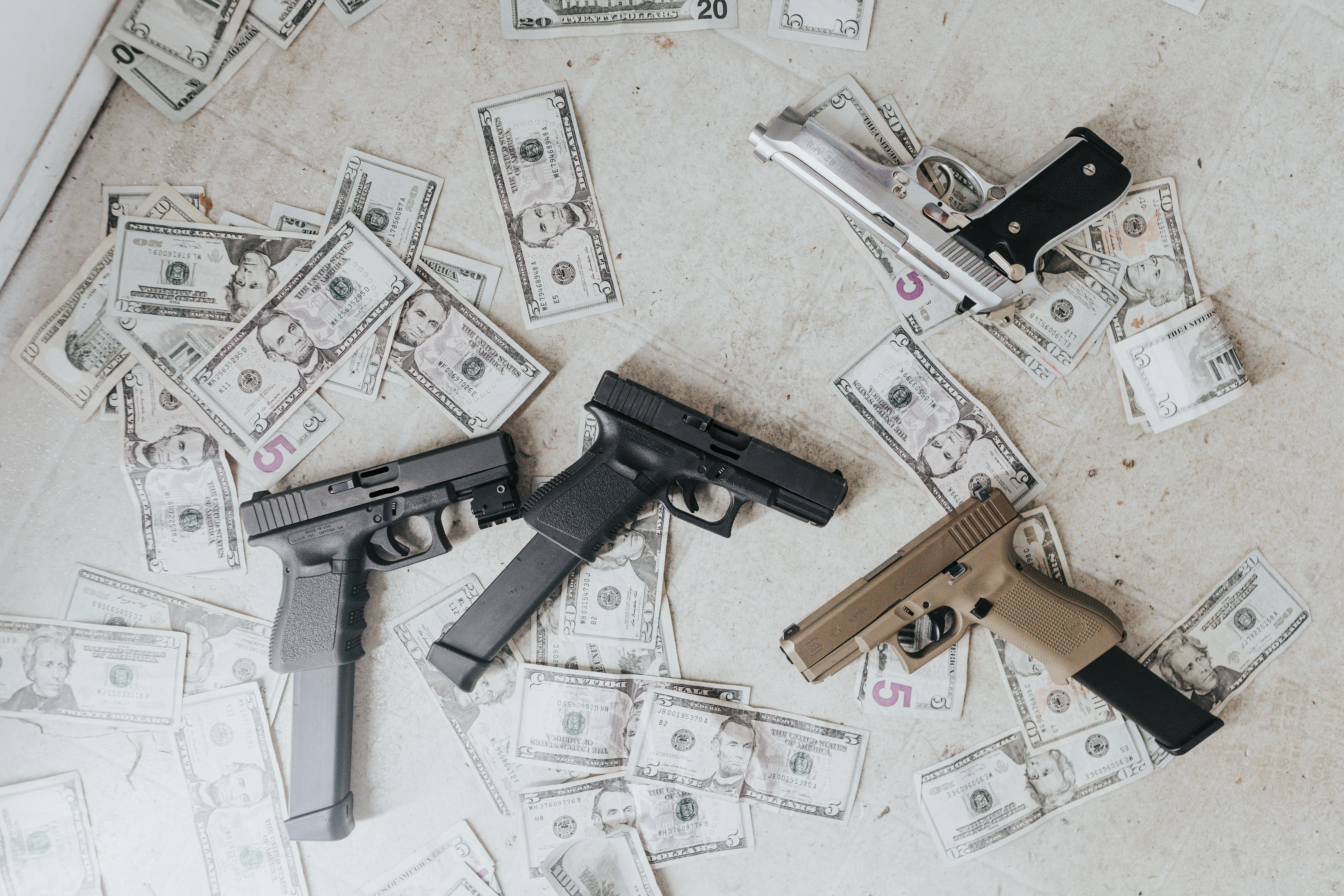 Cash only sign displayed on a gun show vendor table