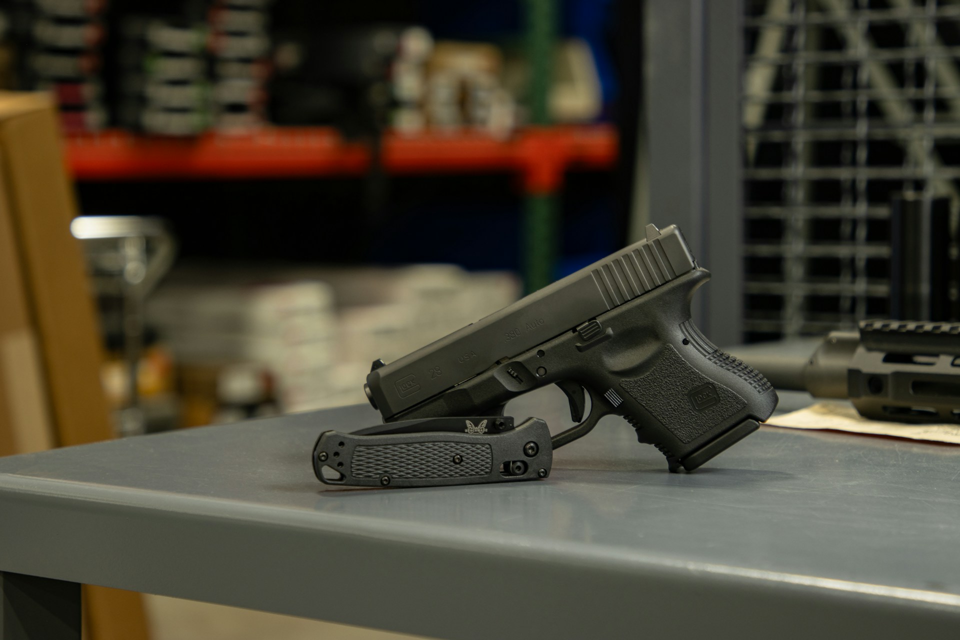 Close-up of handgun slide and barrel showing signs of wear