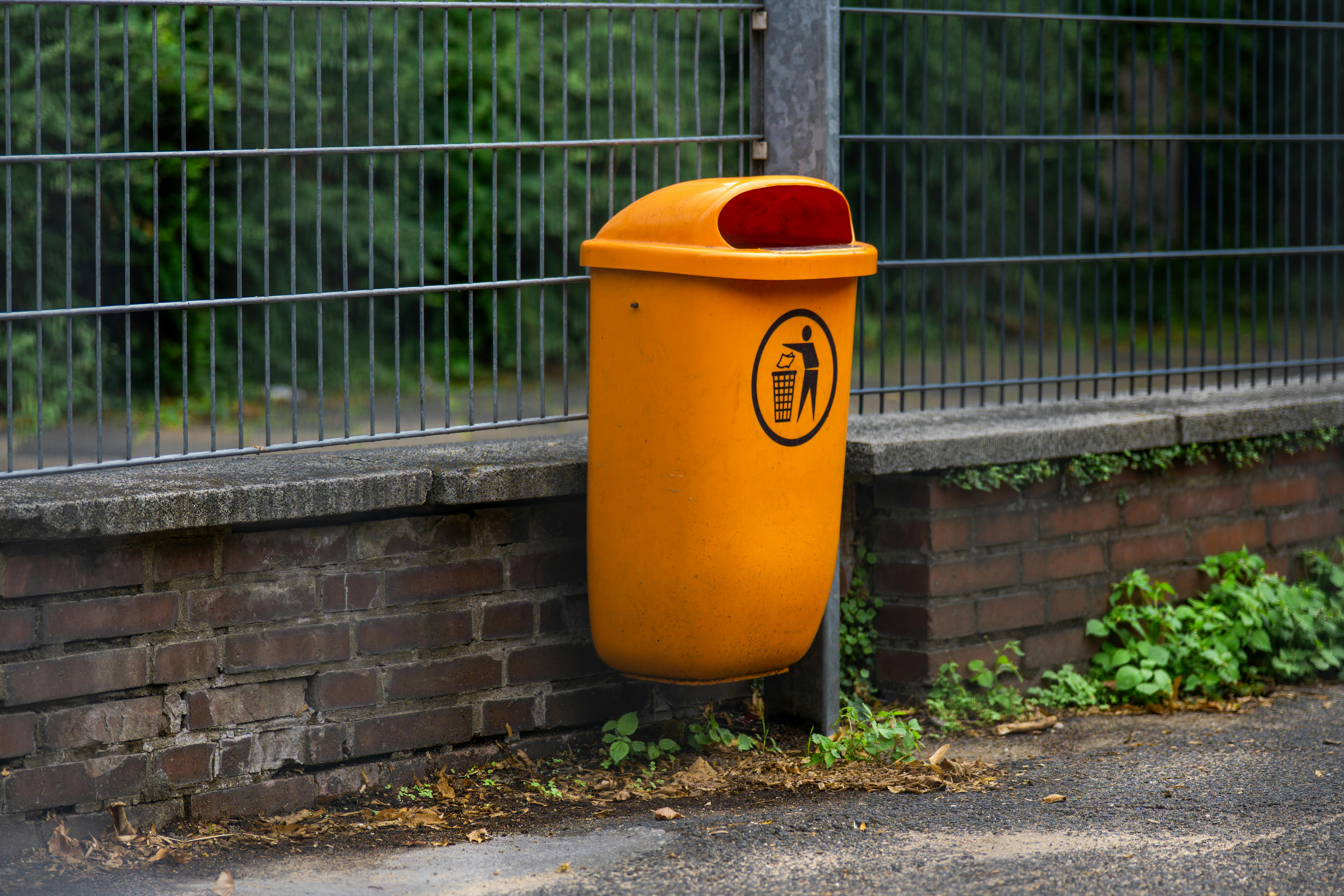 Certified hazardous waste collection site with labeled containers, showing safe disposal.