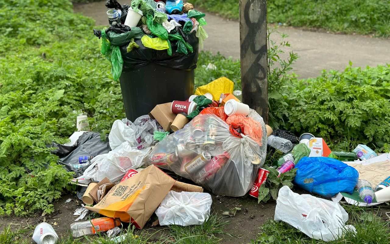 Household trash and plastics properly sorted for recycling to prevent soil and water contamination