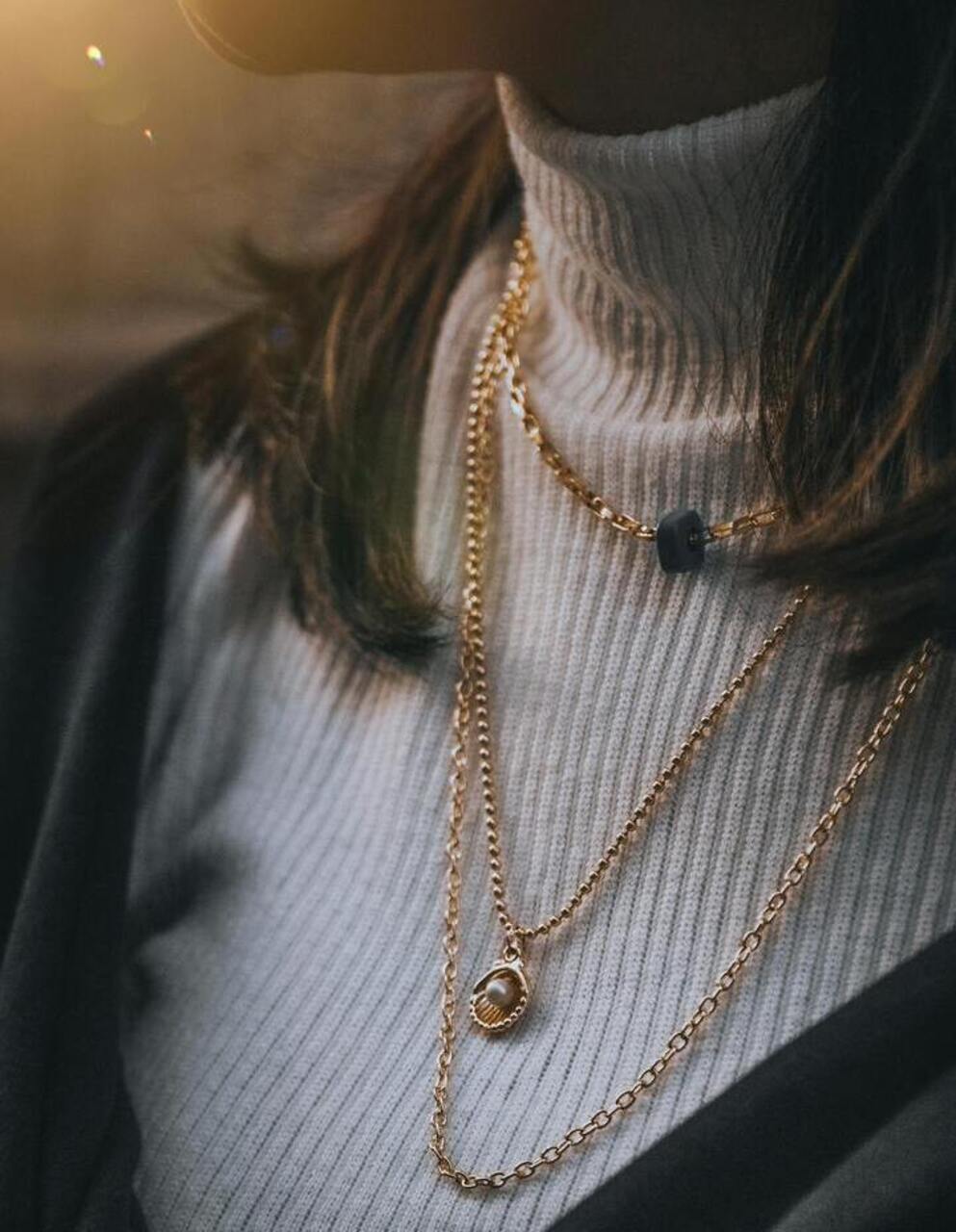 Chunky Chain Necklaces That Tug at Necklines