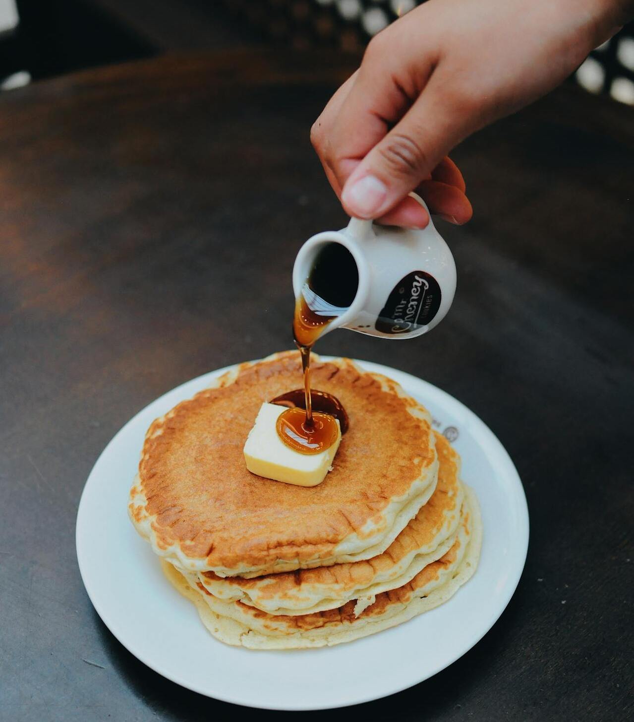 Pancakes drizzled with maple syrup,