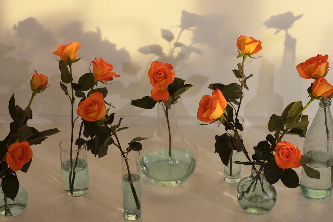 Pastel Roses In Low Glass Bowls