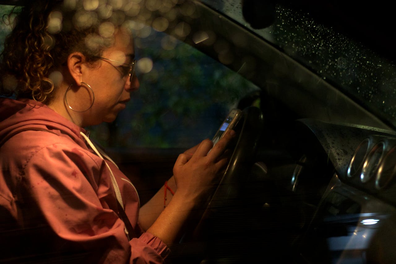 Using Handheld Phones While Driving