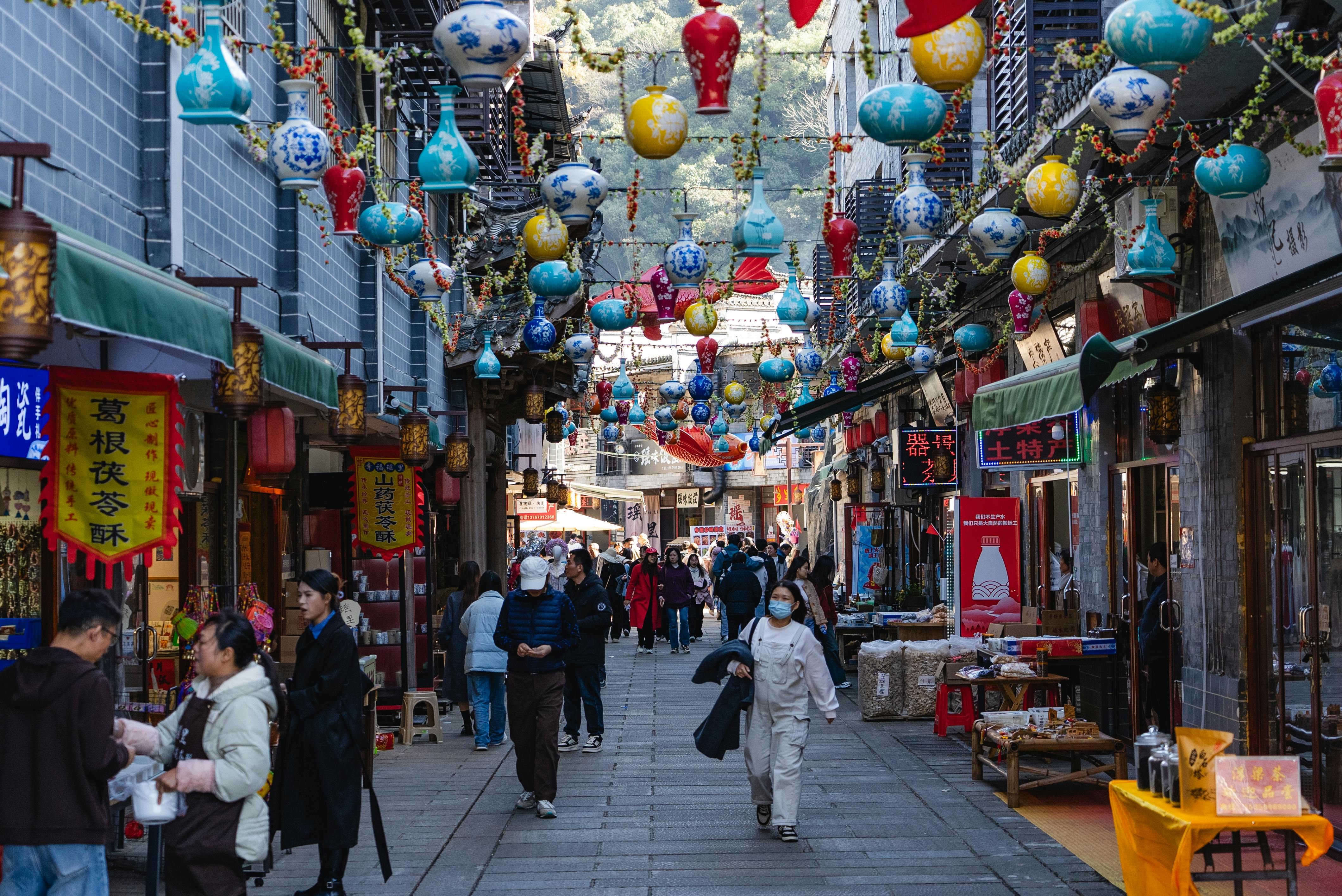Tourists in casual clothing inside a European church while locals wear appropriate attire