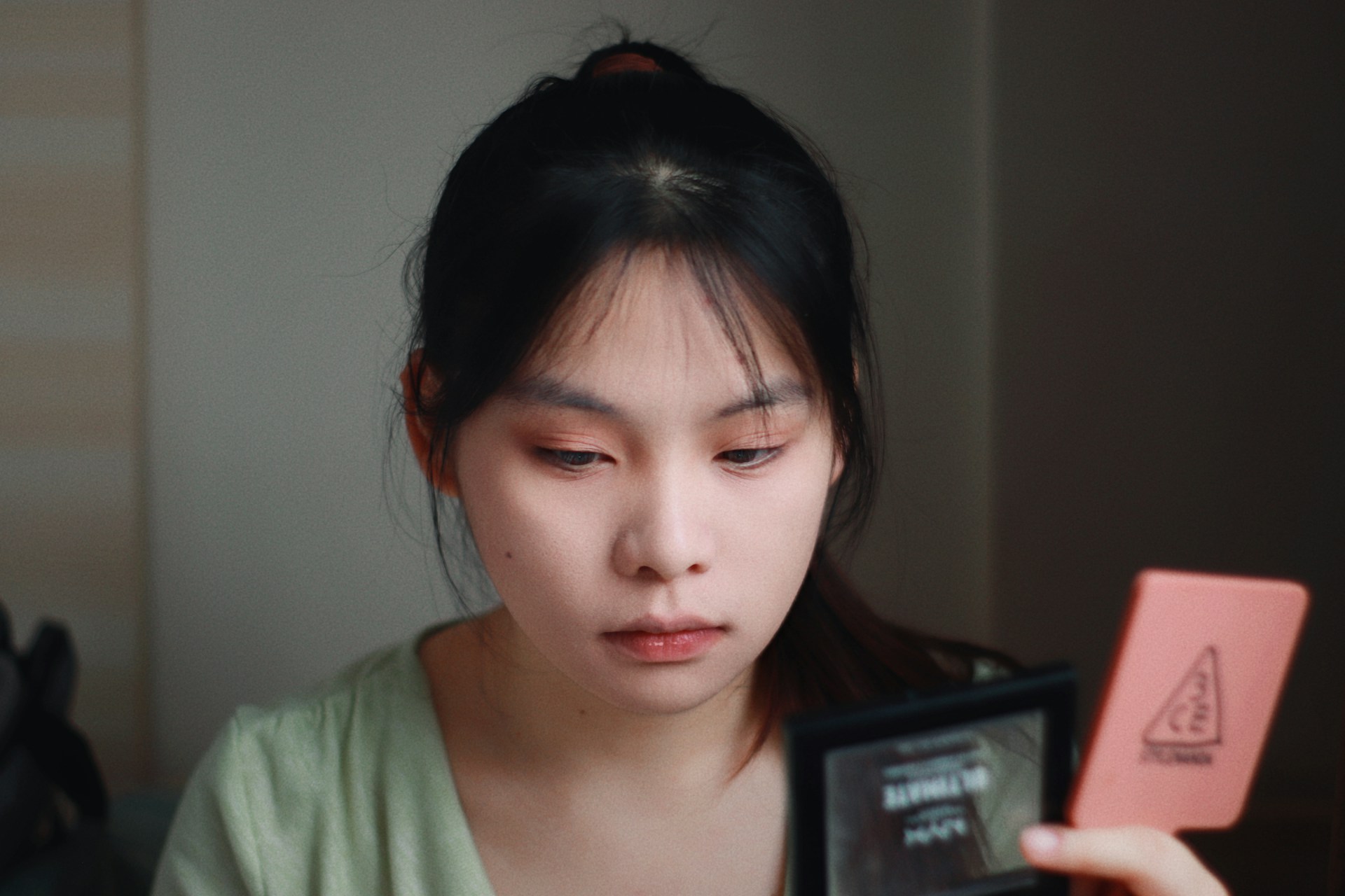 Gen Z worried looking at phone